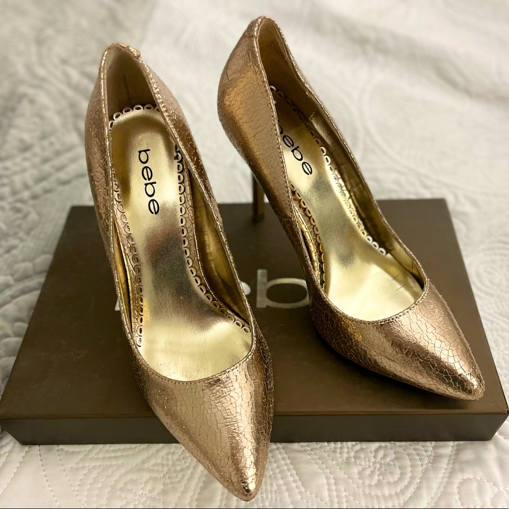 Bebe pumps in light champagne color - great outside condition.